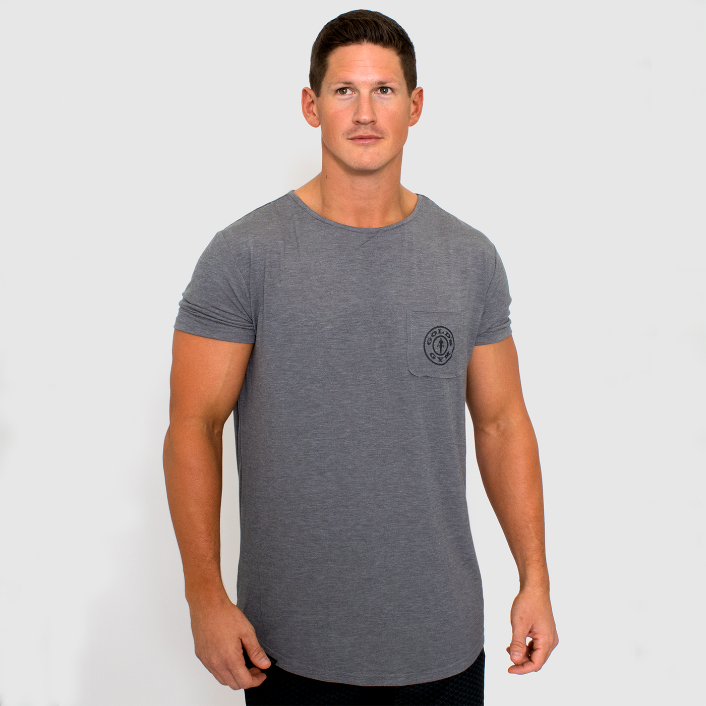 photo of model wearing advance mens elite team in grey heather. golds weight logo in black and left side of chest on pocket.