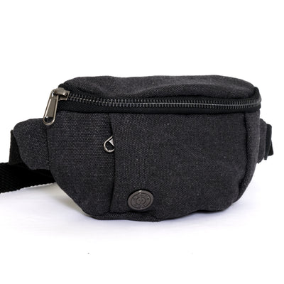 photo of canvas zampetti waist pack in washed black. golds gym weight logo on metal accent near left vertical zipper pocket. large zipper pocket on top.