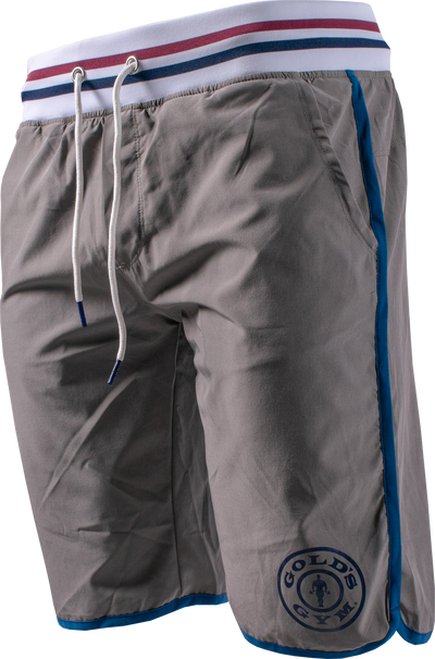 photo of 11 inch short in grey. white waistband with blue and red stripe in center. blue accent lining on outer leg and around leg hole.