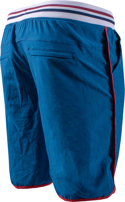 rear photo of 11 inch short in blue. white waistband with blue and red stripe in center. red accent lining on outer leg and around leg hole.