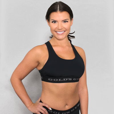 photo of model wearing advance classic bra in black. golds gym printed on lower band.