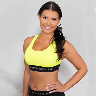 photo of model wearing advance classic bra in neon yellow. golds gym printed on lower band.