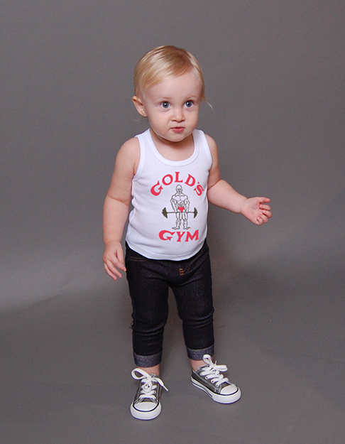 photo of baby model wearing classic joe baby tank in white. red font and shorts on classic joe logo.